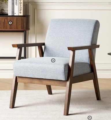 A light gray upholstered armchair featuring a visible dark brown wooden frame, straight back, and simple lines, typical of mid-century modern design. The chair has wide, flat armrests made of the same dark wood as the frame. Its tapered legs slightly splay outwards, contributing to a stable and elegant silhouette. The seat and back cushions appear integrated and are covered in a textured light gray fabric. — 3D model