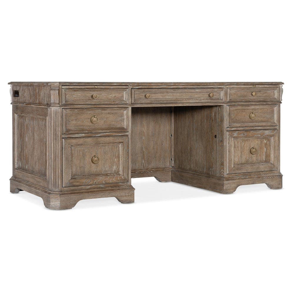 A large, traditional double pedestal executive desk crafted from wood with a weathered finish, featuring multiple drawers and antique brass hardware. — 3D model