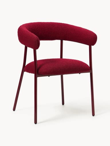 A modern armchair with a curved backrest that extends into armrests. The seat and back are upholstered in a textured, looped fabric. The frame consists of four slender, tapered legs and a support structure for the seat, all finished in a dark red, glossy coating. — 3D model