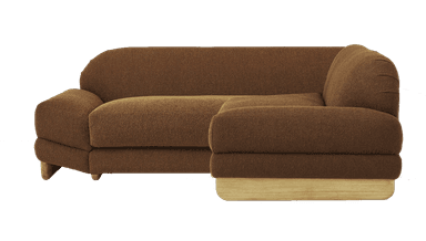 A sectional sofa with a rounded armrest on the left and a chaise lounge extending to the right. The upholstery is a textured brown fabric, and it sits on a light-colored wooden base. The sofa features plush cushioning. — 3D model