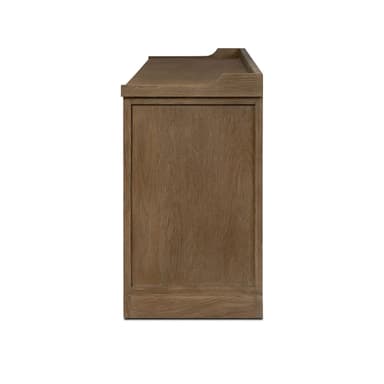 A side view of a modern wood dresser featuring a natural light brown finish, a framed side panel, and a distinctive lipped top surface. — 3D model