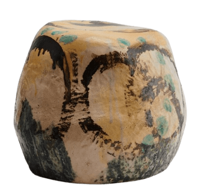 A rounded, roughly cylindrical ceramic object, likely a stool or pedestal, featuring an abstract, earthy glaze pattern in shades of tan, black, and teal. — 3D model