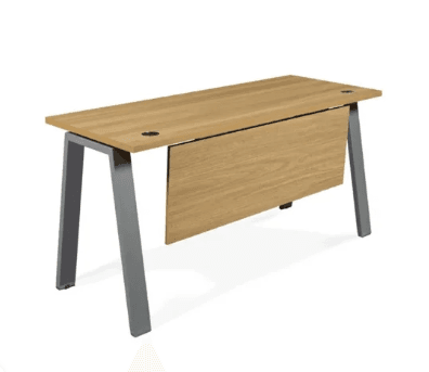 A modern desk with a rectangular wooden top and metal legs. The desk features a partial modesty panel made of wood, positioned towards the front of the desk. Two circular grommets for cable management are visible on the top surface. The legs have an angled, tapering design. — 3D model