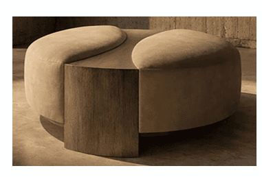 A contemporary round ottoman featuring a distinctive segmented design with alternating sections of beige fabric upholstery and dark brown wood veneer. The circular form is divided into four quadrants, two of which are upholstered and two are wood, creating an appealing contrast in texture and material. The wood segments extend vertically down the sides, forming the base for those sections, while the upholstered parts maintain a soft, cushioned profile. The piece rests on a subtle, recessed base. — 3D model