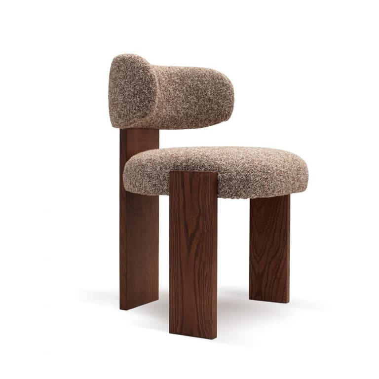 An armless accent chair featuring a distinctive contemporary design with a base made of dark-stained wooden slabs and a seat and low backrest upholstered in textured bouclé fabric. — 3D model