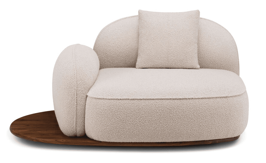 A contemporary sofa with an organic, rounded silhouette. It features a textured boucle upholstery in a neutral cream color. The sofa has a low profile and is supported by a dark wood base that extends outward to form a side surface on the left. A single matching throw pillow is placed on the seat. The design is modern with a soft, plush appearance. — 3D model