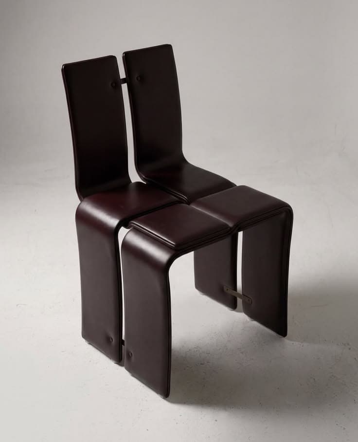 A two-person modular seating unit upholstered in dark brown leather, featuring continuous curved forms for the back, seat, and integrated legs, connected centrally. — 3D model