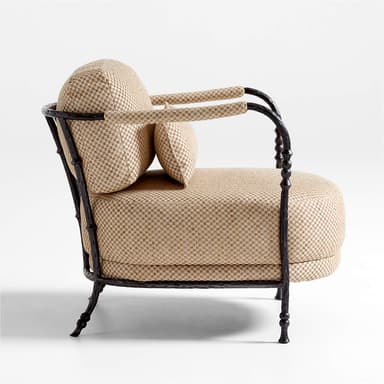 A comfortable lounge chair featuring a dark, textured forged iron frame with decorative baluster-like turnings on the uprights and legs. The armrests are partially wrapped in a contrasting natural rope material. The seat, backrest, and a lumbar pillow are upholstered in a tightly woven, checkered fabric with beige and brown tones. — 3D model