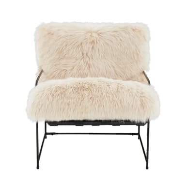 A modern armchair featuring a minimalist black metal frame and plush, cream-colored faux fur upholstery covering the seat, back, and armrests. The frame has a clean, geometric design with slender legs and supports. The fur is long and textured, giving the chair a soft, inviting appearance. — 3D model