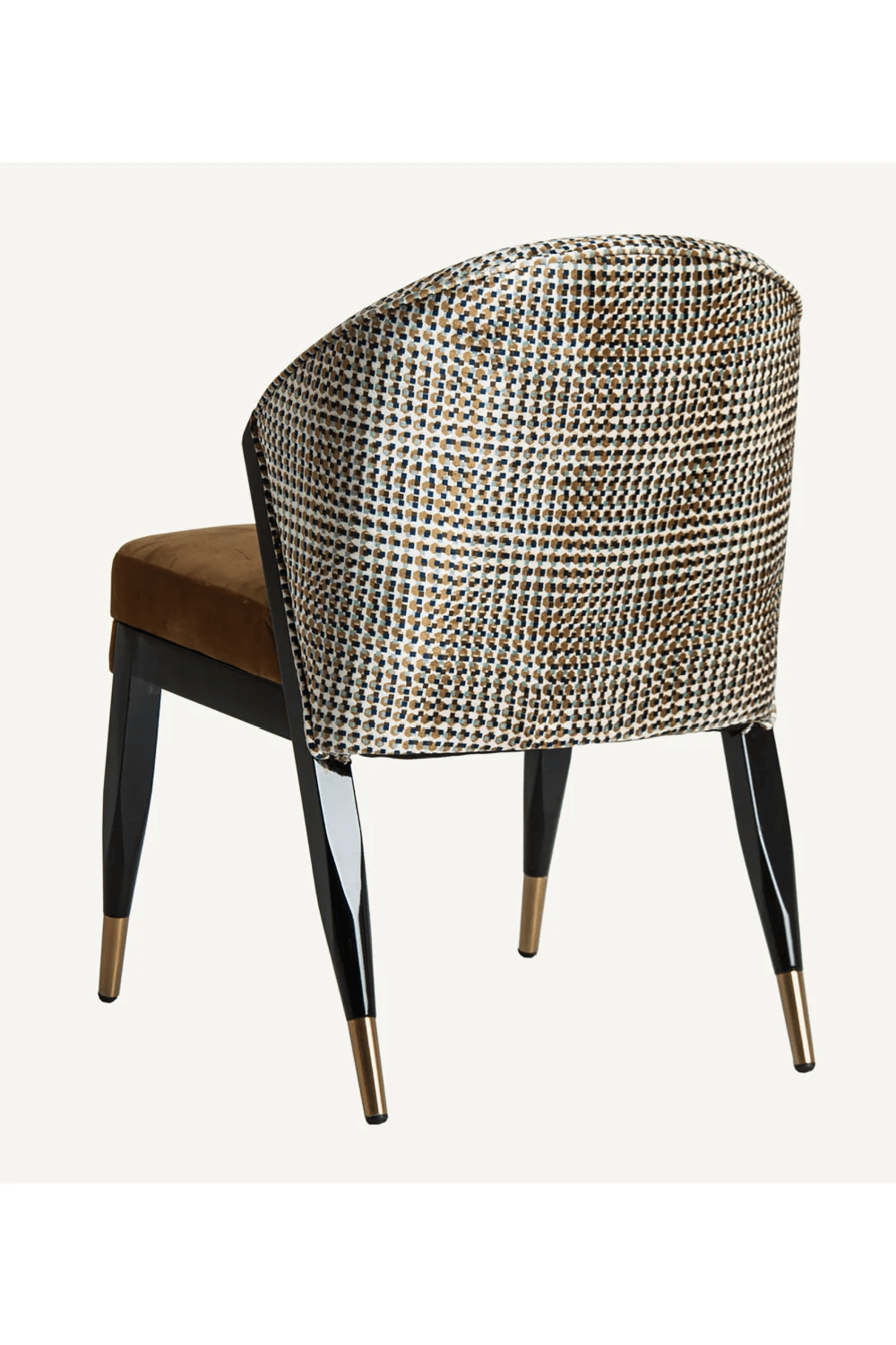 An armchair with a curved backrest upholstered in a patterned fabric, and a seat upholstered in brown velvet. The chair has four tapered legs with a glossy black finish and brass-colored caps at the bottom. — 3D model