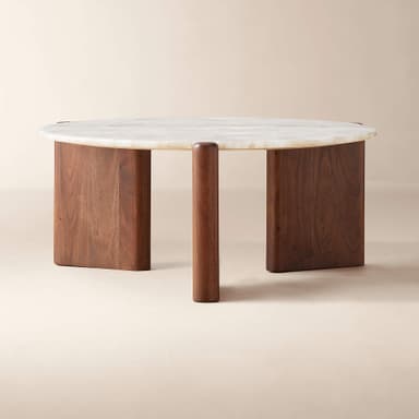 A close-up view of a coffee table section, highlighting its distinctive top and edge. The tabletop appears to be constructed from irregularly shaped pieces of translucent, white-to-off-white natural stone, possibly agate or quartz, which are irregularly pieced together. The material exhibits natural inclusions and variations in opacity, creating a unique, crystalline pattern. The edge of the tabletop is rounded. A portion of the table base is visible, featuring a dark brown, polished wood with a visible grain, likely walnut or a similar hardwood. The wood has a smooth, lustrous finish. — 3D model