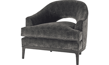 A contemporary armchair with a rounded, barrel-shaped back and a deep seat. The upholstery features a subtle geometric pattern. The chair is supported by a dark wooden base and four tapered legs. — 3D model