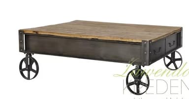 A rectangular coffee table featuring a rustic wooden top and a dark metal frame, supported by decorative industrial-style wheels. — 3D model