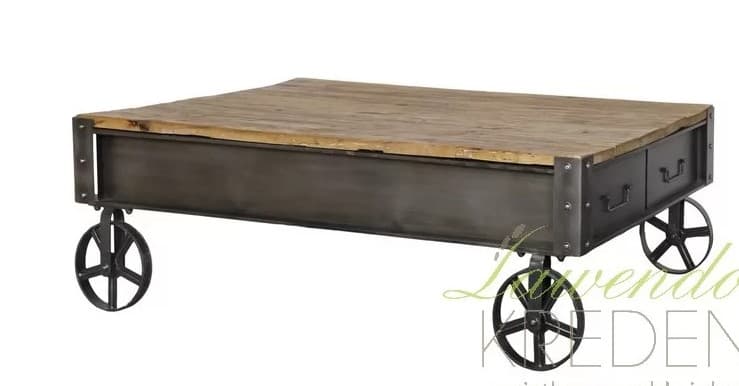 A rectangular coffee table featuring a rustic wooden top and a dark metal frame, supported by decorative industrial-style wheels. — 3D model