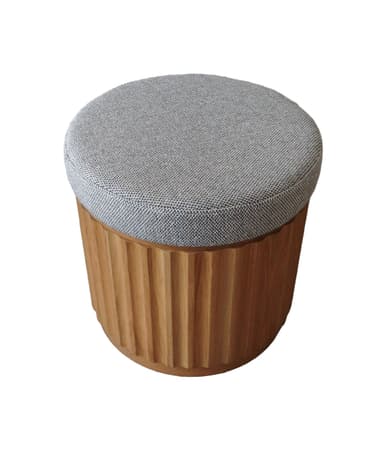 A contemporary round ottoman featuring a distinctive fluted oak wood base and a grey textured upholstered top. The wood grain is visible, and the fluted design adds a textural element to the base, while the fabric top provides a comfortable, cushioned surface. — 3D model