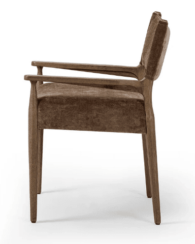An upholstered armchair featuring a dark wooden frame and rich brown, textured fabric on the seat and backrest. The chair has integrated wooden arms and four slightly splayed, tapered legs. The backrest is gently curved, suggesting a comfortable seating experience. — 3D model