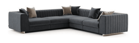 An L-shaped sectional sofa upholstered in dark gray fabric, featuring distinct channel tufting on the exterior of its arms and backrests. The sofa has a low-profile design with wide, comfortable seat cushions and backrests, accompanied by several throw pillows in coordinating dark gray and lighter beige tones. A subtle metallic plinth-style base supports the structure. — 3D model