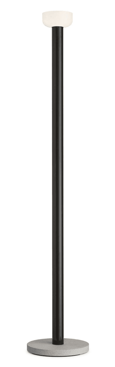 A modern floor lamp with a cylindrical black stem and a circular grey base. The lamp features a translucent white diffuser at the top, housing the light source. The design is minimalist and contemporary. — 3D model