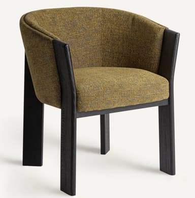 A contemporary armchair with a curved backrest and arms. The seat and back are upholstered in a textured fabric. The frame and legs are constructed from dark-finished wood, providing a stark contrast to the upholstery. — 3D model
