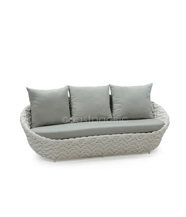 A light grey woven outdoor loveseat featuring a curved, oval-shaped body and upholstered with matching light grey seat and three back cushions. — 3D model