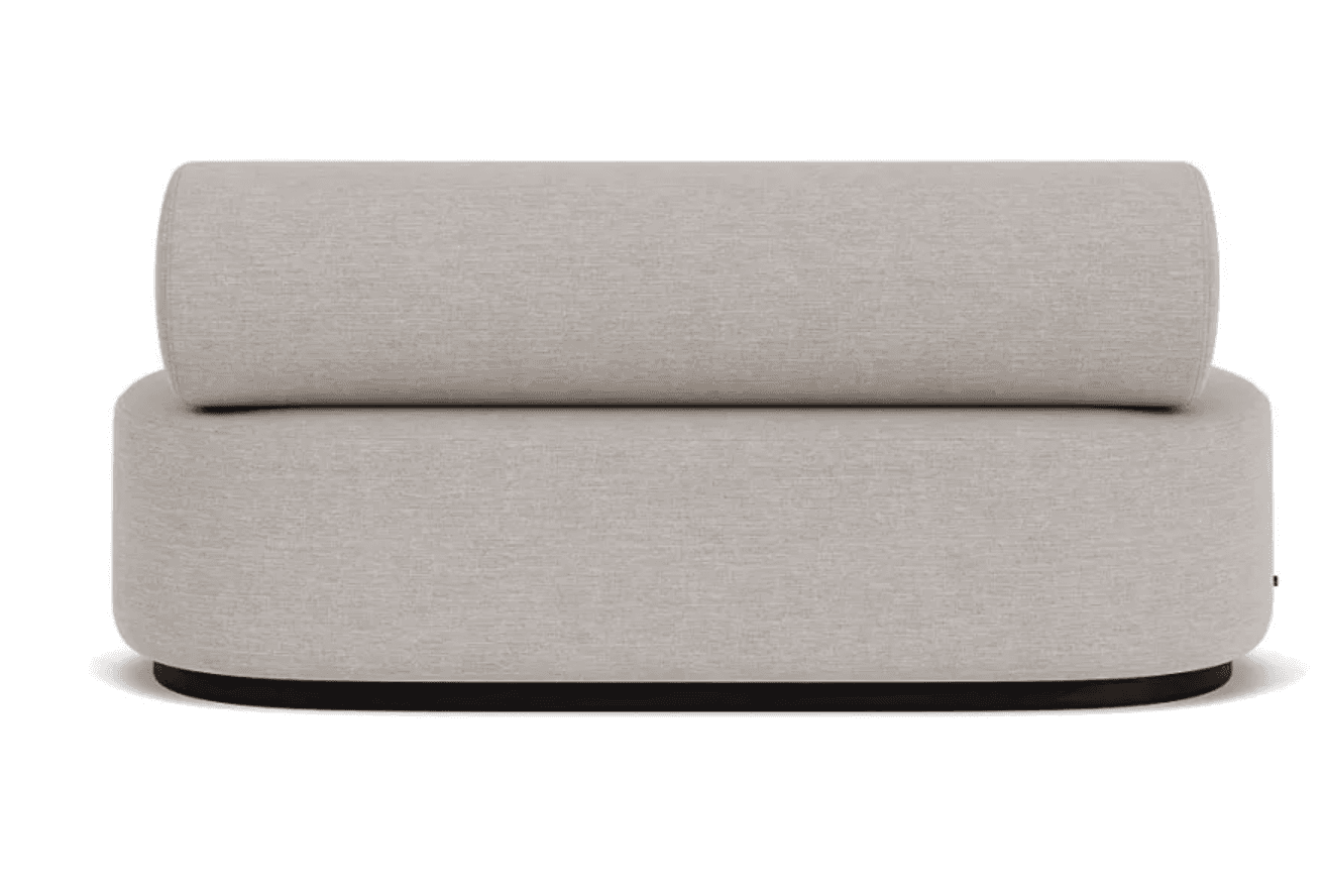 This is a modular lounge chair segment designed for flexible seating arrangements. It features a cylindrical backrest that sits atop a rounded, upholstered base. The overall form is soft and inviting, with clean lines and a neutral color palette. The base appears to be supported by a dark, low-profile plinth or frame, providing a subtle contrast to the light upholstery. — 3D model