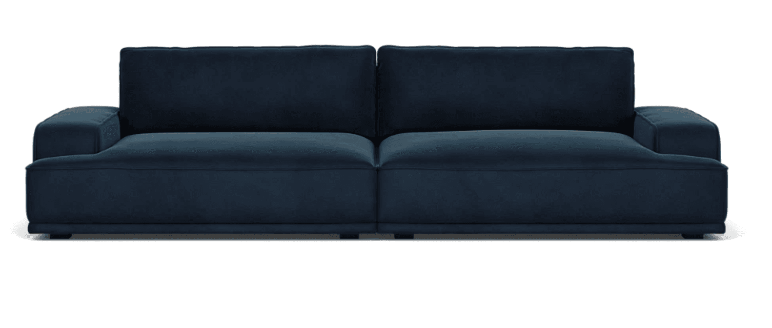 A modern, deep navy blue upholstered sofa with a low profile and plush cushions. It features clean lines, a square armrest on the left, and appears to be a modular or two-seat design, with visible seams dividing the seat and back cushions. — 3D model