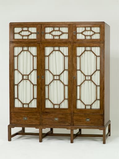 A tall, rectangular, dark wood storage cabinet featuring three vertical sections. Each section includes an upper door with an intricate geometric lattice overlay, backed by a light-colored opaque panel, and a lower storage drawer. The cabinet rests on a plinth base with short, block-style legs, indicative of Asian-inspired design. — 3D model