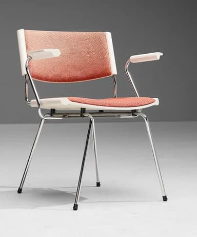 A modern armchair with a tubular metal frame and a molded plastic shell seat and back. The seat and back are upholstered with a textured orange-red fabric. The armchair features slender, chrome-plated legs that splay outwards and integrated armrests. — 3D model