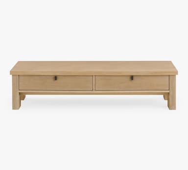 A rectangular coffee table with a light wood finish and two drawers. The table features a simple, modern design with sturdy legs and dark square drawer pulls. — 3D model