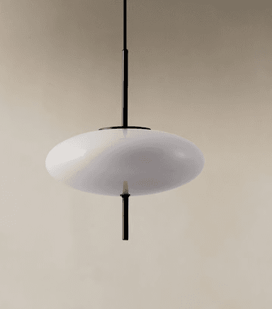 A modern pendant light featuring a large, horizontally oriented ovoid diffuser made of opaque white material, suspended by a slender black rod and cable. The design is minimalist and contemporary. — 3D model