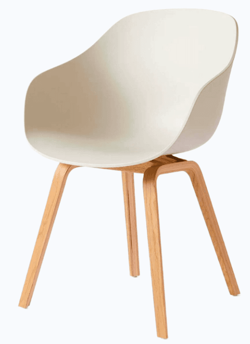 A modern dining chair with a molded, curved shell seat and backrest, supported by four slender wooden legs. The seat and back are integrated into a single piece, forming a smooth, ergonomic shape. The legs are made of bentwood, creating a natural and organic aesthetic that contrasts with the synthetic shell. — 3D model