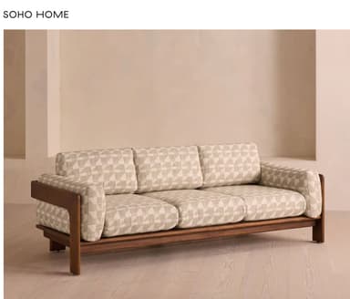 A mid-century modern style three-seater sofa featuring an exposed dark wood frame that forms the base, arms, and legs. It is upholstered in a light beige fabric with a geometric pattern. The sofa has three individual seat cushions and three matching back cushions, suggesting a comfortable and structured seating experience. — 3D model