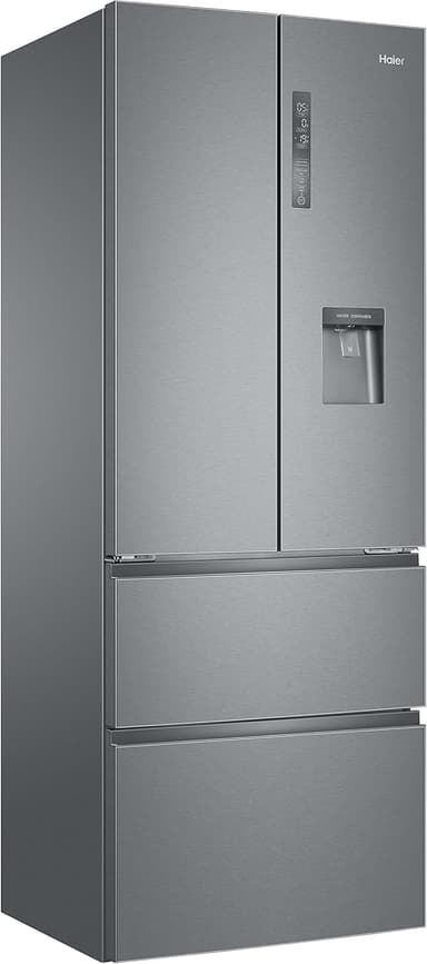 A stainless steel refrigerator, appearing to be a built-in or integrated model, featuring a double-door design with a freezer compartment above and a refrigerator compartment below. The doors are flush with the cabinet and seem to have minimal handles or no visible handles. The image quality does not allow for observation of any other features or branding. — 3D model