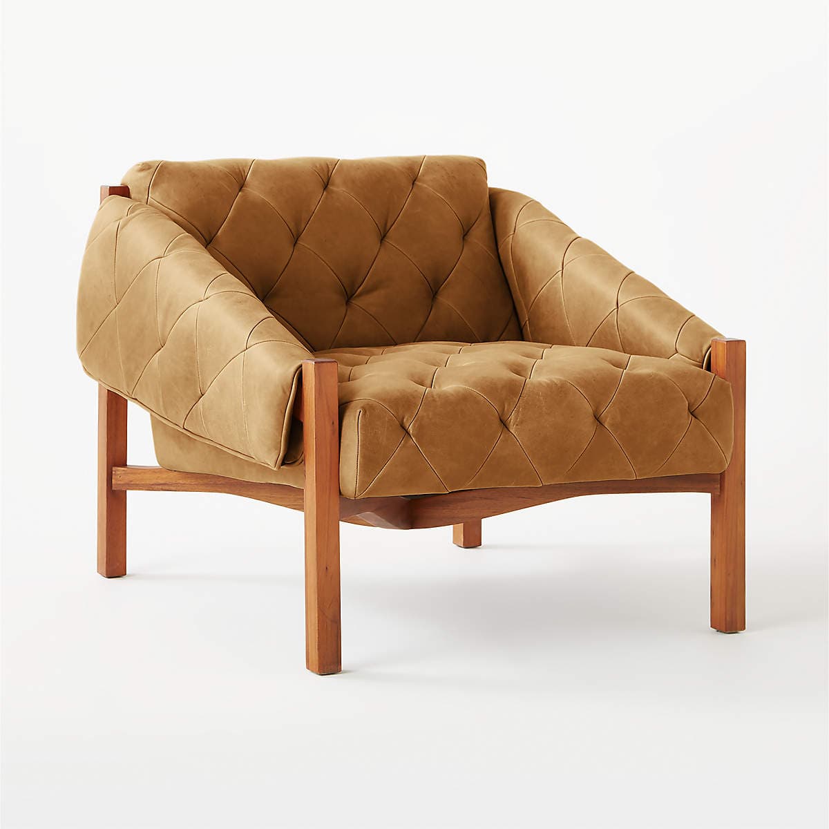 A modern lounge chair featuring a sturdy exposed wooden frame in a natural finish, supporting a generously cushioned, diamond-tufted tan leather or leather-look upholstery. The deep tufting covers the seat, back, and armrests, creating a plush and inviting appearance. — 3D model