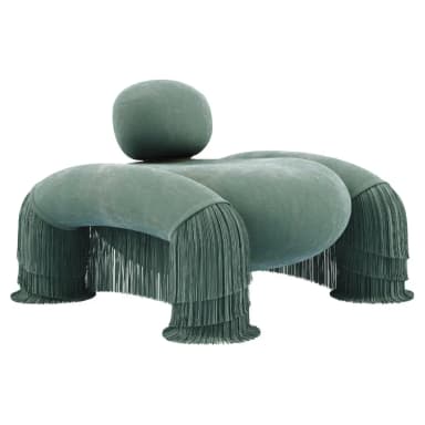 A highly stylized and sculptural lounge chair upholstered in a soft, plush greenish-blue velvet-like fabric, featuring prominent, multi-layered fringe tassels on its four rounded, stubby supports. It includes a separate, rounded backrest cushion that maintains the overall organic form. — 3D model