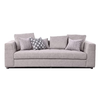 A contemporary three-seater sofa upholstered in a light grey textured fabric, featuring clean lines, track arms with subtle button tufting on the exterior, and generous loose back and seat cushions. It comes with four decorative throw pillows in coordinating grey tones and patterns. — 3D model