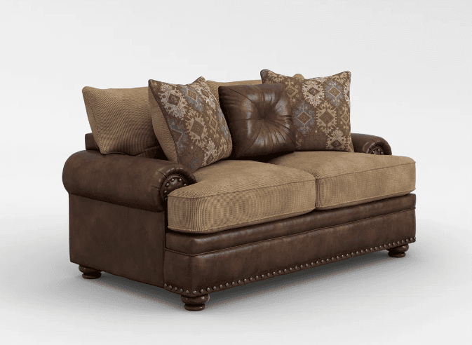 A two-seater loveseat featuring a brown leather frame and arms with upholstered fabric cushions and accent pillows. It has traditional styling with rolled arms, nailhead trim, and turned bun feet. — 3D model