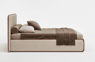 A side view of a contemporary upholstered bed with a rectangular headboard and a low-profile frame. The headboard and frame are covered in a textured beige fabric, with a thin contrasting brown piping detail along the edges. The bed is dressed with a white sheet, a brown velvet-like duvet or comforter, and two pillows: one rectangular in light beige and one square bolster pillow in dark brown. A brown throw blanket with a herringbone pattern and fringe is draped across the foot of the bed. — 3D model