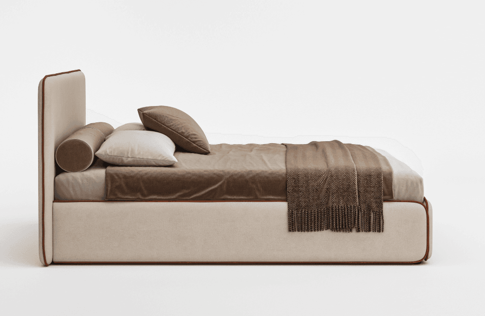 A side view of a contemporary upholstered bed with a rectangular headboard and a low-profile frame. The headboard and frame are covered in a textured beige fabric, with a thin contrasting brown piping detail along the edges. The bed is dressed with a white sheet, a brown velvet-like duvet or comforter, and two pillows: one rectangular in light beige and one square bolster pillow in dark brown. A brown throw blanket with a herringbone pattern and fringe is draped across the foot of the bed. — 3D model