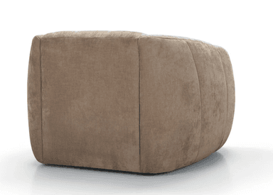 A single contemporary accent chair featuring a rounded, barrel-like silhouette. The chair is upholstered in a soft, beige velvet or velour fabric. It has distinct channel tufting on the arms and sides, which contributes to its plush appearance, and button tufting on the backrest. The base is recessed, giving the chair a floating effect. Its overall design emphasizes comfort and a modern aesthetic. — 3D model
