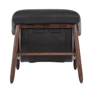 A contemporary lounge chair with a low-slung, curved profile, featuring a generously padded seat and back upholstered in black material, likely leather or faux leather. The upholstery is cradled within a sturdy, splayed dark wood frame, giving it a modern yet inviting appearance. The design emphasizes comfort and a relaxed posture. — 3D model