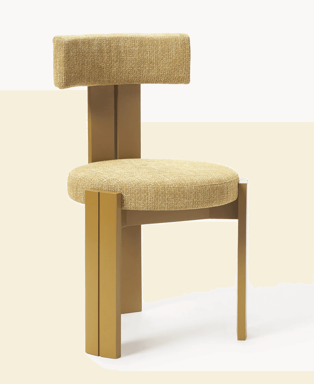 A modern dining chair with a distinct geometric design. The chair features a padded seat and a T-shaped backrest, both upholstered in a textured yellow fabric. The frame and legs are constructed from a solid material, possibly wood or metal, finished in a matte gold or brass color. The legs have a unique angular profile, with two parallel vertical elements forming each front leg. — 3D model