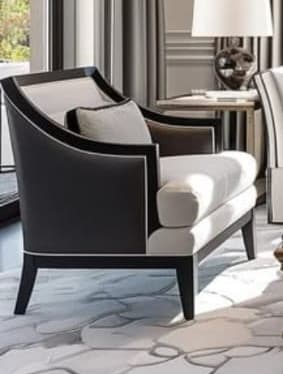 An elegant contemporary accent armchair with a prominent exposed dark wood frame and light-colored upholstery. The chair features a curved backrest and integrated armrests, along with straight, tapered legs. It includes a seat cushion, backrest cushion, and a matching lumbar pillow, all upholstered in a neutral fabric with contrasting white piping. — 3D model