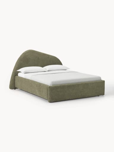 This is an image of a modern upholstered platform bed featuring a distinctive, large, and sculptural curved headboard. The bed frame and headboard are entirely covered in a textured, muted green/khaki fabric. The headboard curves upwards and then gently back, creating a visually interesting silhouette. The rear of the headboard appears to be finished in a darker, contrasting fabric or material. A white mattress and simple white bedding are visible on the bed frame. — 3D model