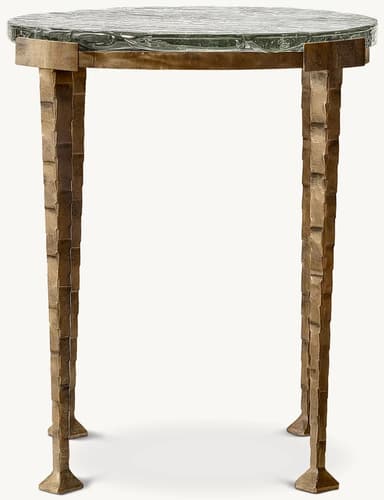 A compact, round accent table featuring a thick, heavily textured fused glass top supported by a four-legged, sculptural bronze-toned metal base with a chiseled texture. — 3D model