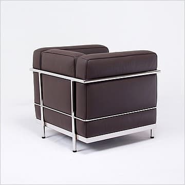 A modernist armchair featuring a visible, polished chrome-plated tubular steel frame and plush, dark brown leather cushions. The chair has a distinctive boxy silhouette, with separate cushions for the seat, back, and armrests. The external frame envelops the upholstered components, creating a stark contrast between the industrial metal and the soft leather. The design is compact and features clean, geometric lines, characteristic of early 20th-century modern design. — 3D model