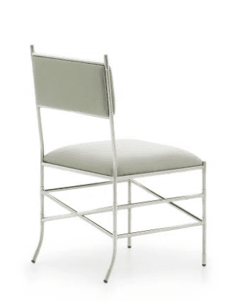 A contemporary side chair featuring a polished metal frame and upholstered seat and back. The frame is slender and appears to have decorative, possibly bamboo-inspired, joint detailing. The seat and backrest are upholstered in a light sage green fabric. The chair includes X-shaped stretchers for stability. — 3D model