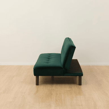 A dark emerald green velvet futon sofa bed with button tufting on the backrest and seat, supported by tapered wooden legs. — 3D model