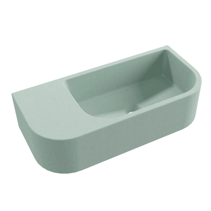 A wall-mounted sink with a rectangular basin and an integrated flat surface on the left side, featuring a rounded front edge. The sink has a matte finish and appears to be made of a solid, non-porous material. — 3D model