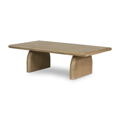 A low rectangular coffee table with a thick, rounded top and two sturdy, cylindrical legs positioned towards the ends of the table. The piece has a minimalist design and appears to be made from solid wood. — 3D model